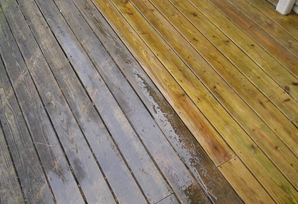 Before and after pressure washing by Win Clean Plus in Sandy Springs, showcasing a clean and revitalized deck